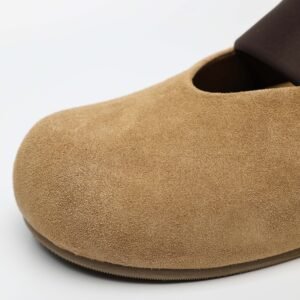 IMG11253 1 Made from first-layer calf suede only,Closed toe design for soft coverage,Soft footbed for everyday comfort,Easy slip-on mule structure,Japanese-inspired minimalist style